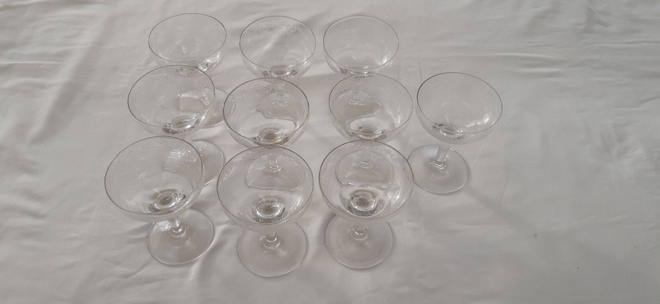 Ten champagne coupes from the Belle Époque.