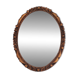 Miroir mural ovale en bois doré