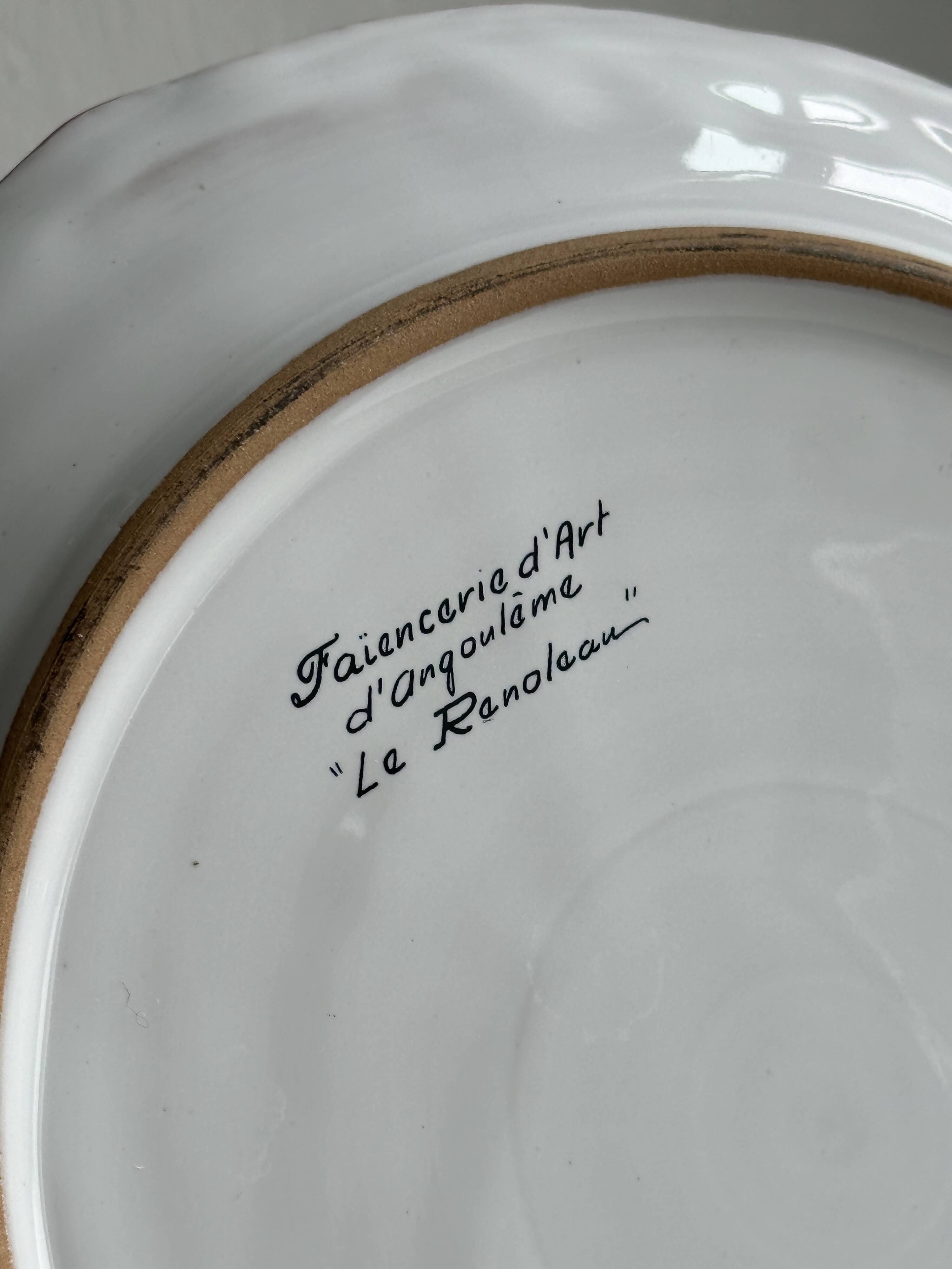 Decorative plate in Angoulême earthenware.