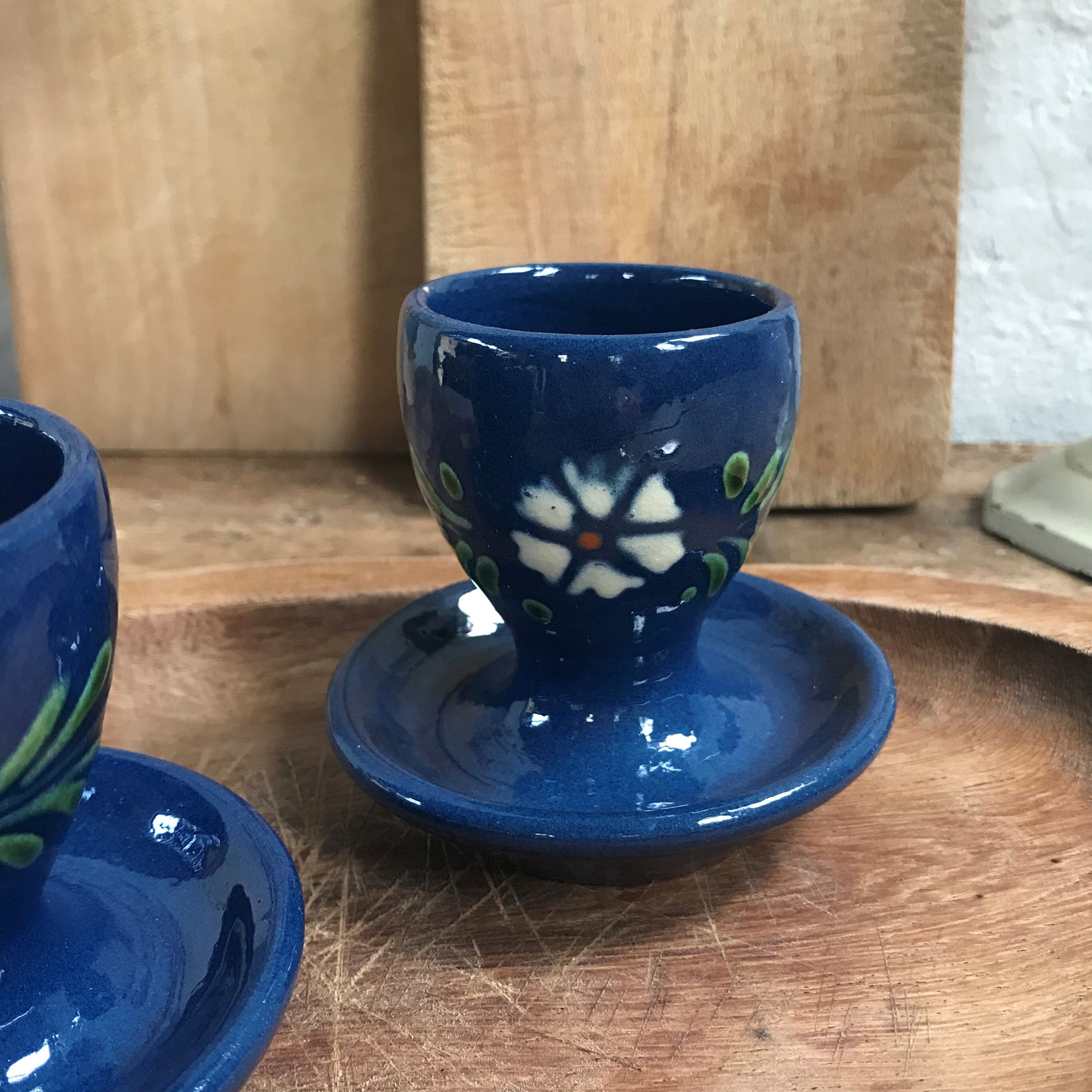 Pair of ceramic cockroaches