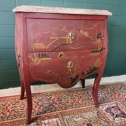 French XIX jumping chest of drawers in Chinese lacquer ox and golden blood