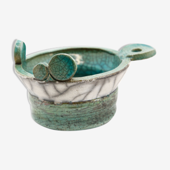 Atypical cup in turquoise and gray raku with signature