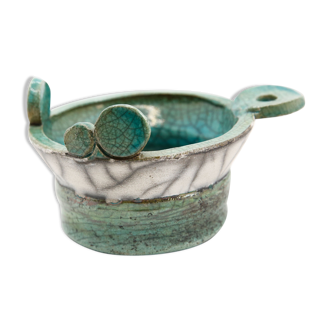 Atypical cup in turquoise and gray raku with signature