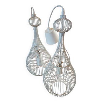 Pair of white metal pendant lights