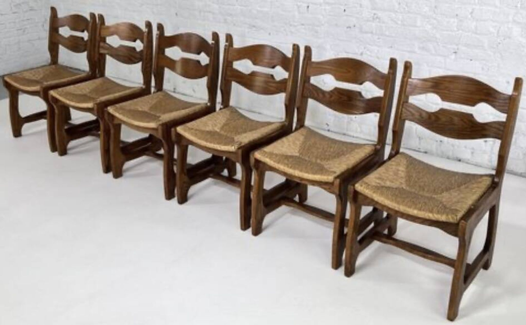 Guillerme and Chambron set of six light oak chairs