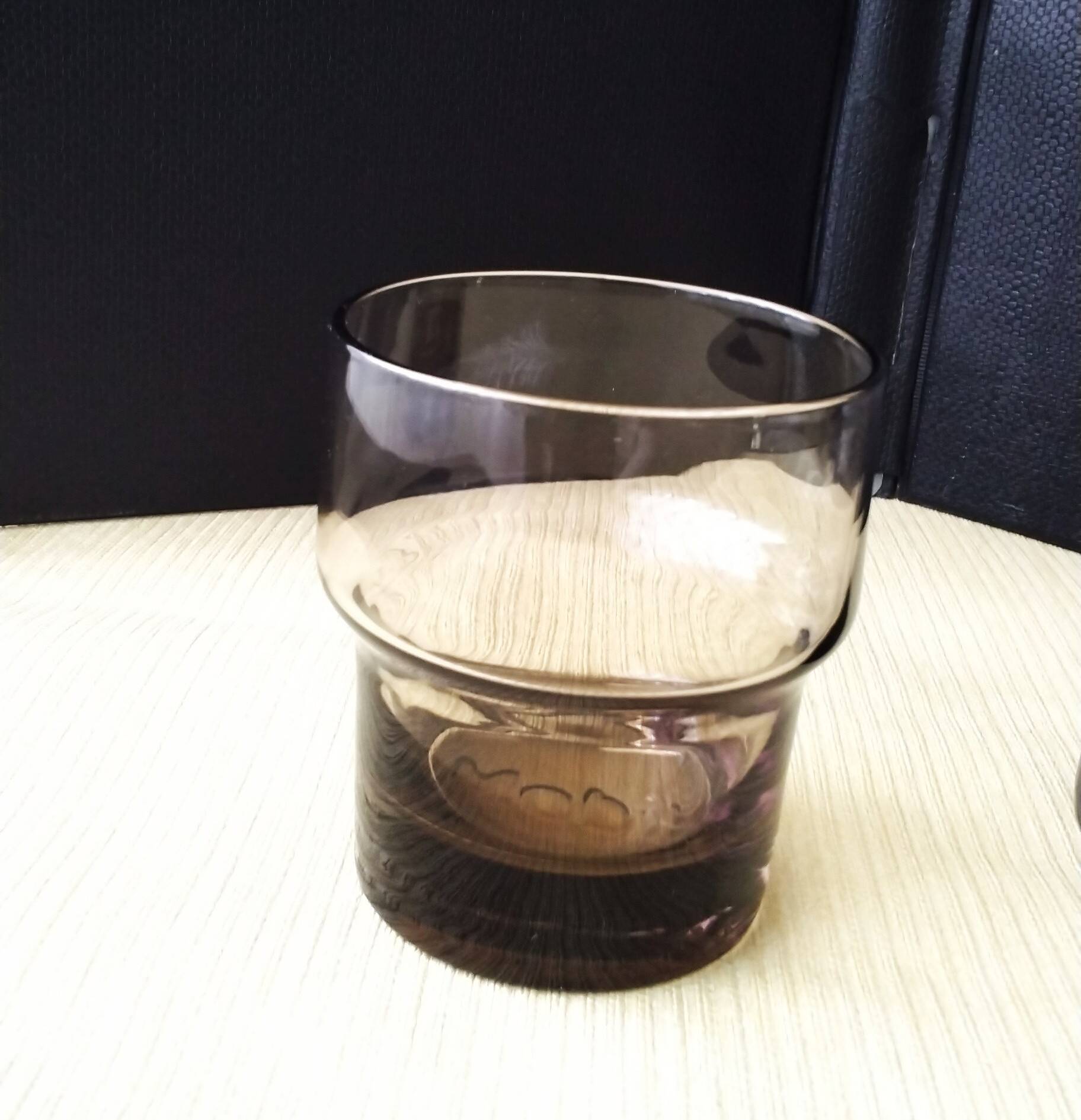 Pair of smoke-coloured glasses Mobil 1970s