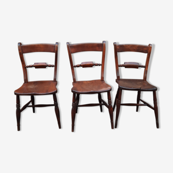 Three vintage wooden chairs