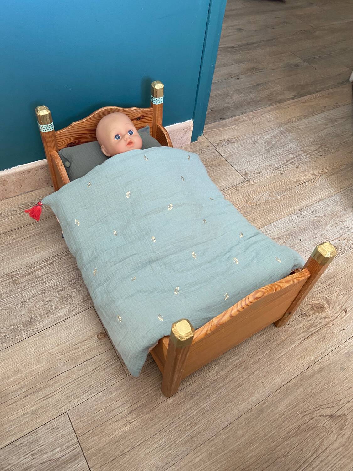 Wooden doll bed