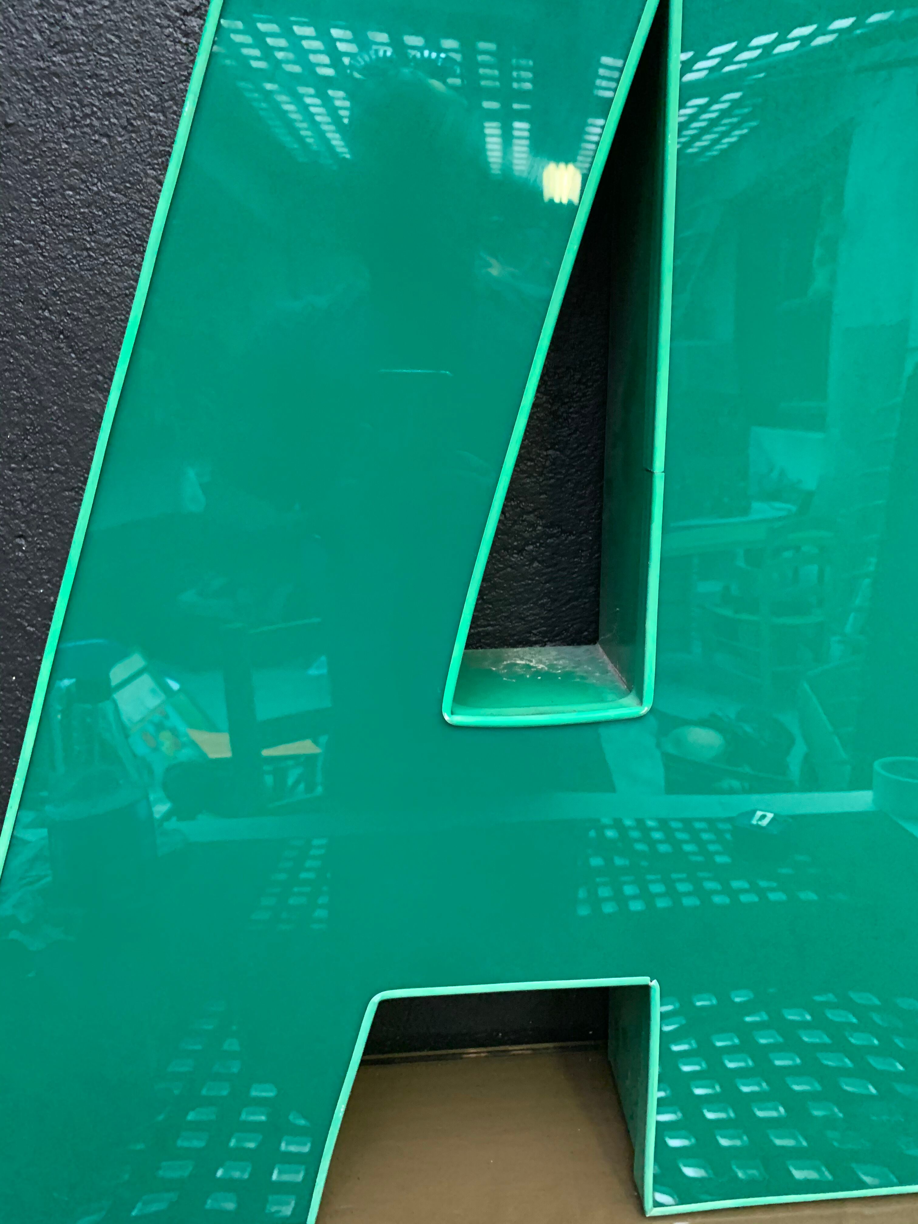 Old letter in metal and plexiglass, industrial decoration