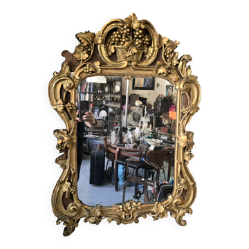 Louis XV period mirror in gilded wood and stucco, 18th century