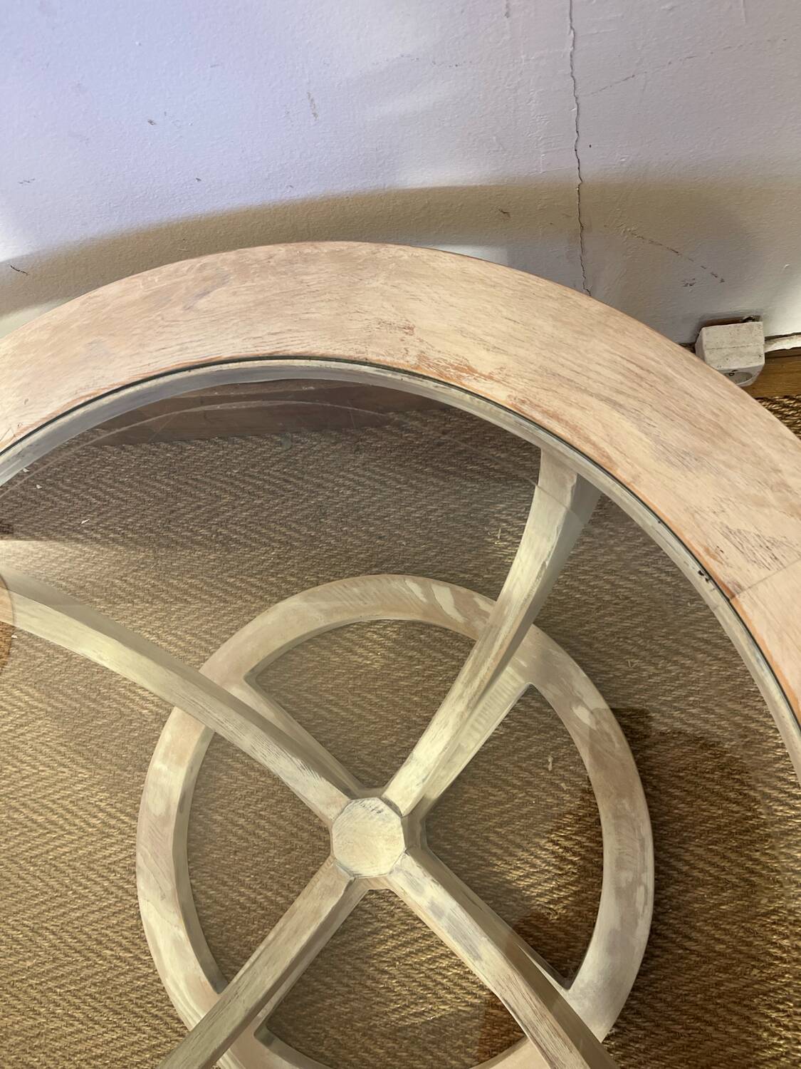 Oval patinated wood and beveled glass coffee table