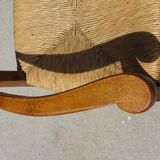 Grandfather's armchair in wood and straw.