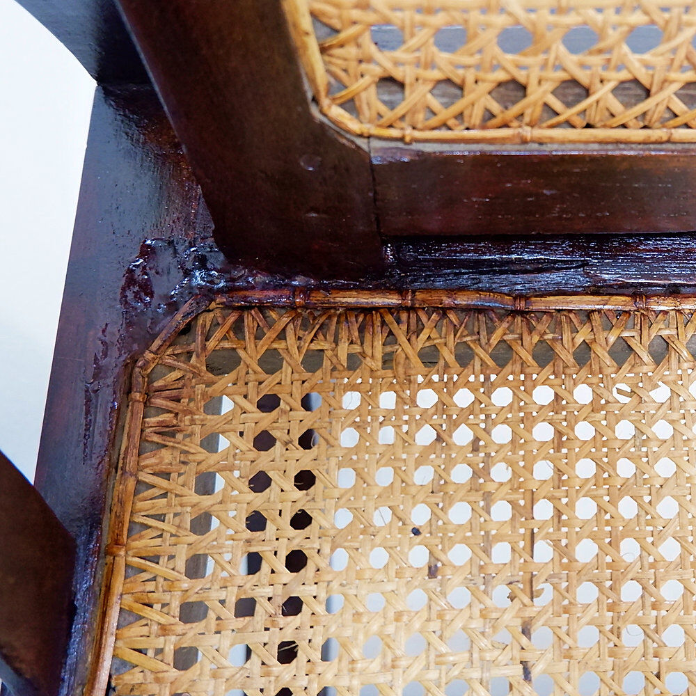 Art Deco armchairs in wood, with cane seat and backrest, circa 1930.