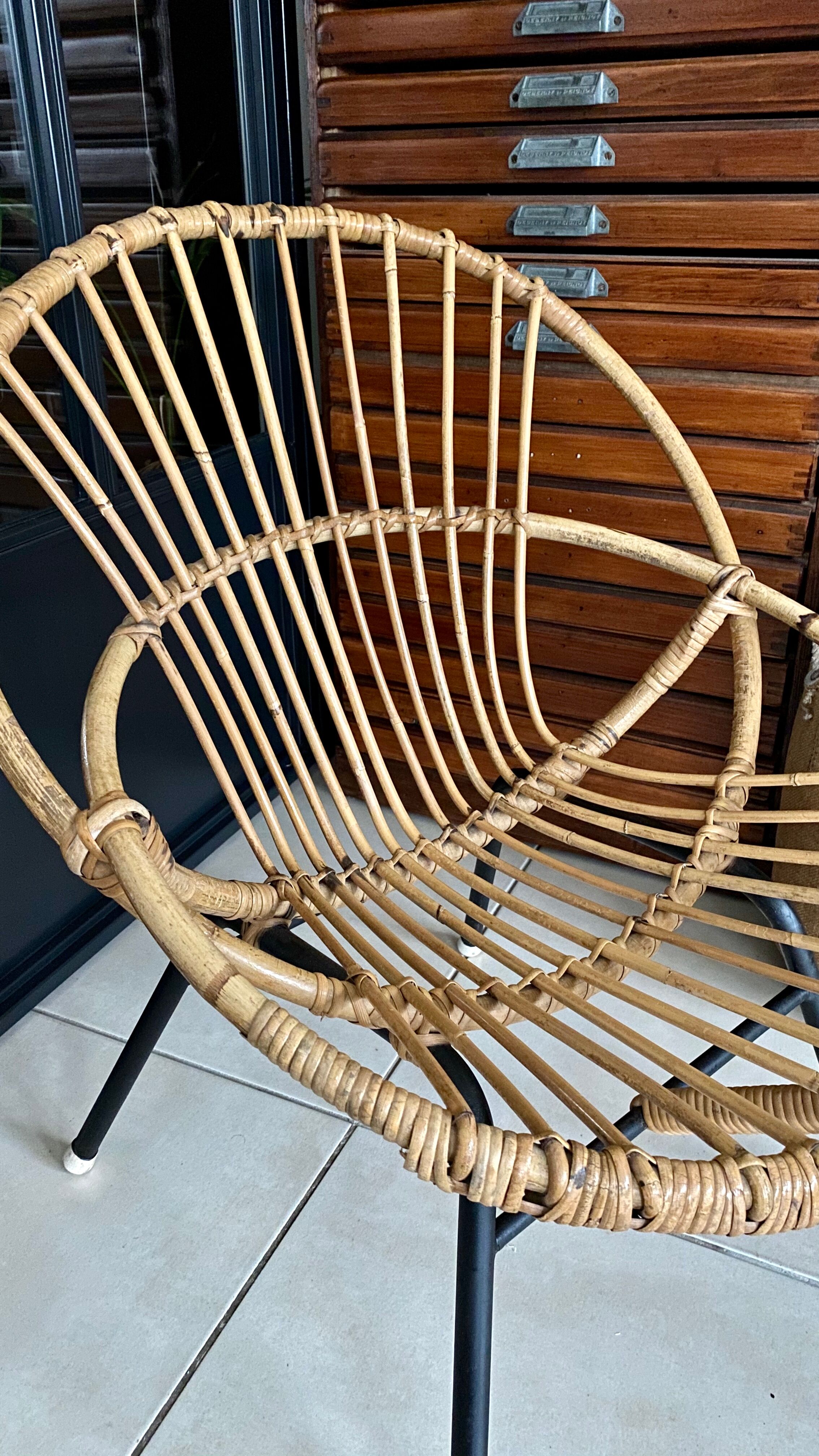 Old vintage metal foot rattan chair
