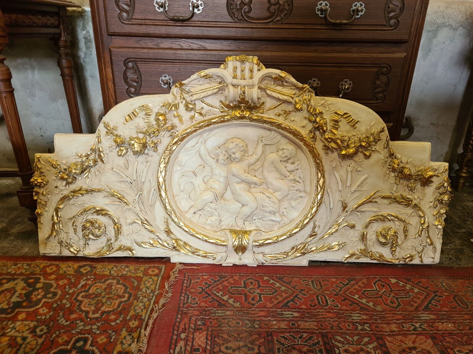 pediment panel with stucco angels