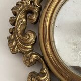 Old mirror in gilded wood