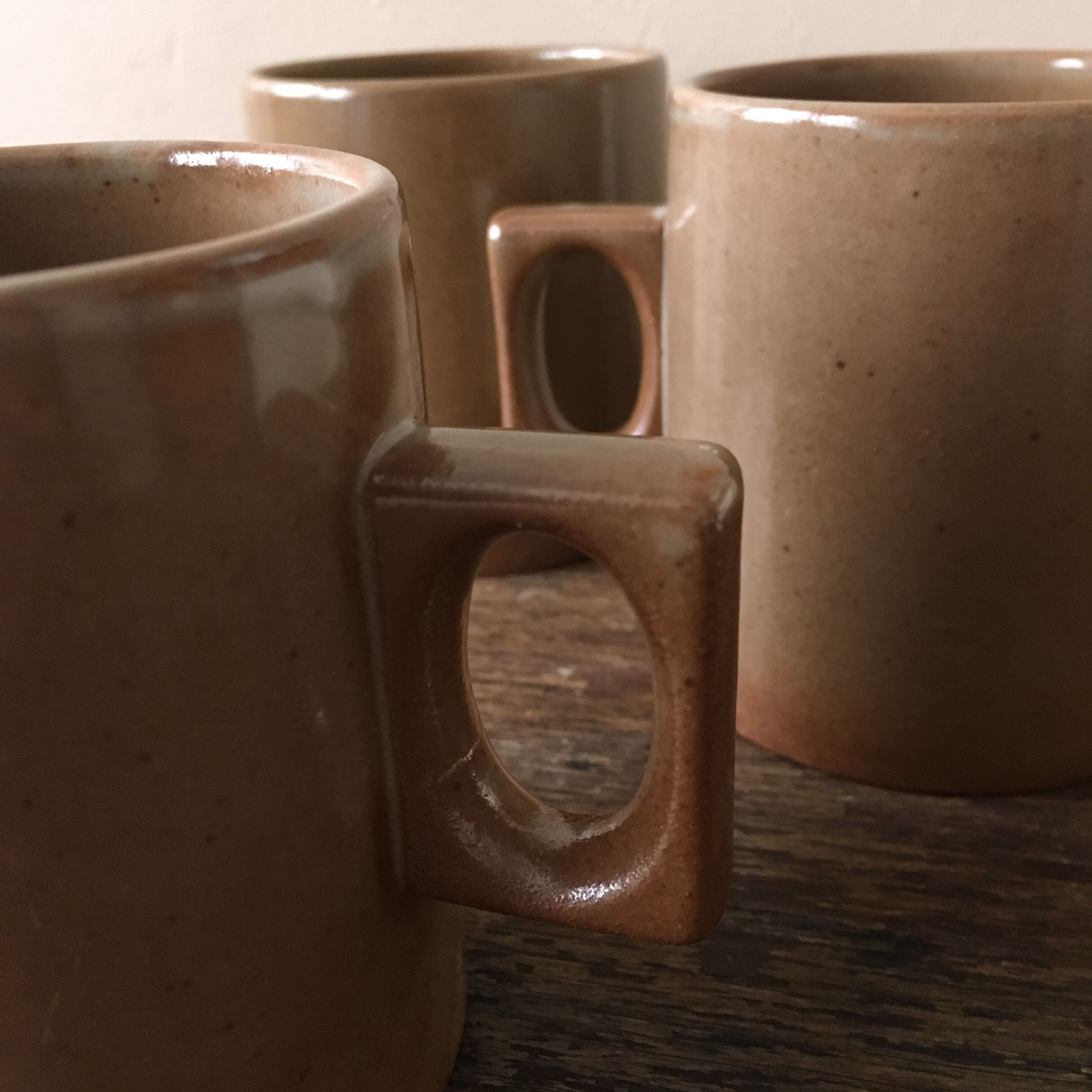 Lot of three cups or mugs stoneware of great fire of Brenne, France