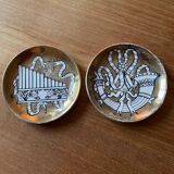 Small Fornasetti plates