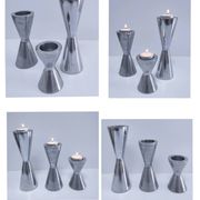three "diabolo" aluminium design candle holders 90