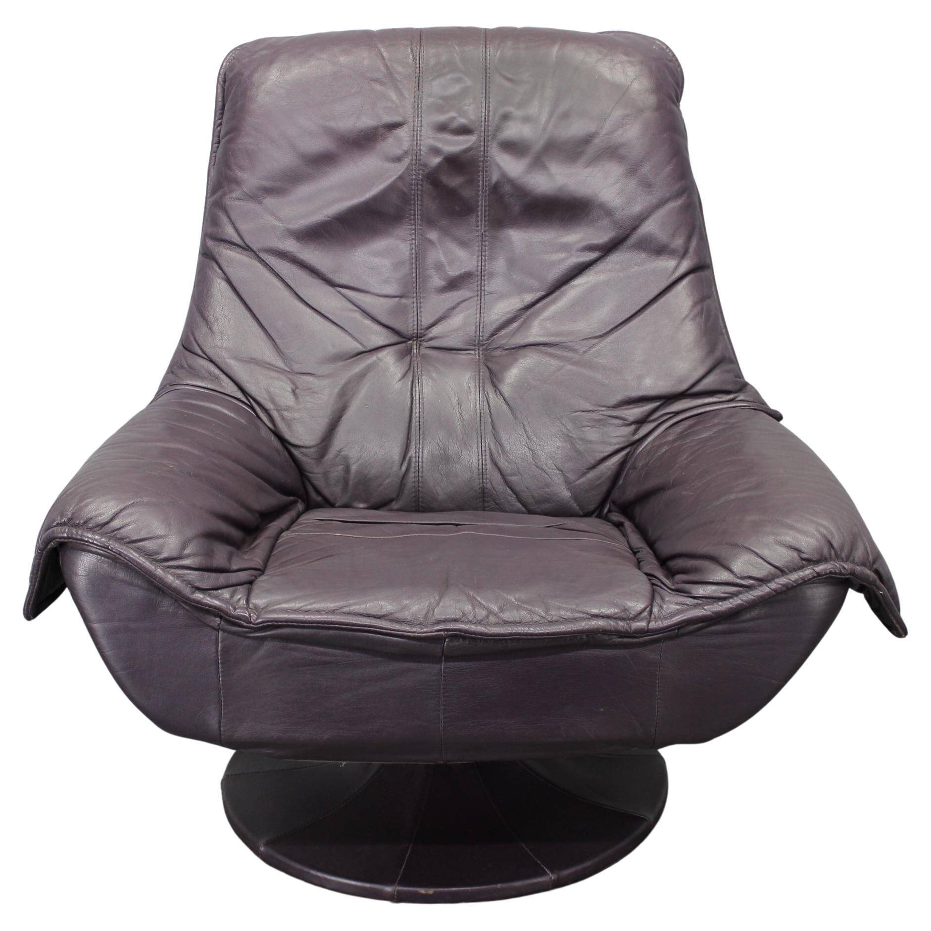 Italian dark purple leather swivel lounge chair, 1980s