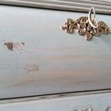 Curved patinated chest of drawers
