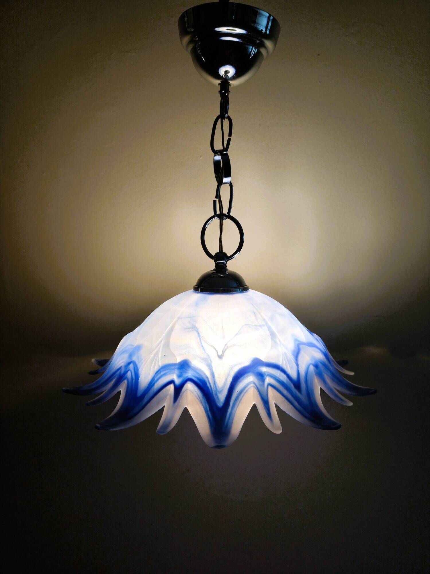 Vintage blue and white stylised flower pendant