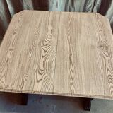 Art Deco dining table with raw wood top