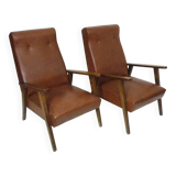 Pair of Scandinavian armchairs in brown leatherette and wood from the 50s and 60s