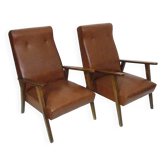 Pair of Scandinavian armchairs in brown leatherette and wood from the 50s and 60s