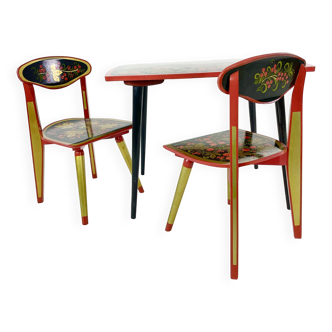 Traditional Khokhloma children's table and pair of chairs, USSR, circa 1950