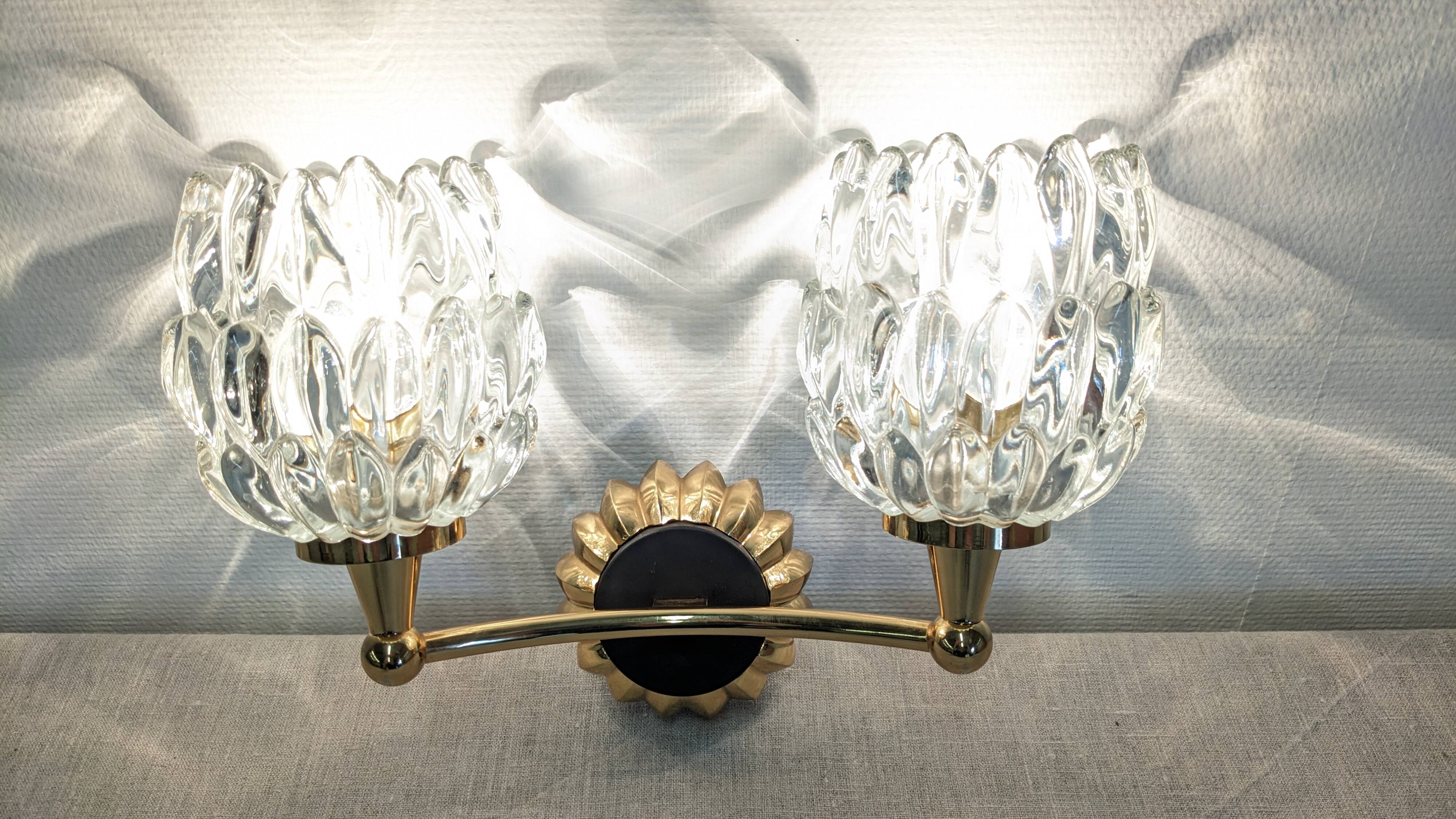 Set of 4 modernist double wall lights by Maison Arlus, France circa 1950.