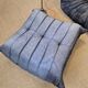 Togo sofa by Ligne Roset and its pouf from the 1970s.