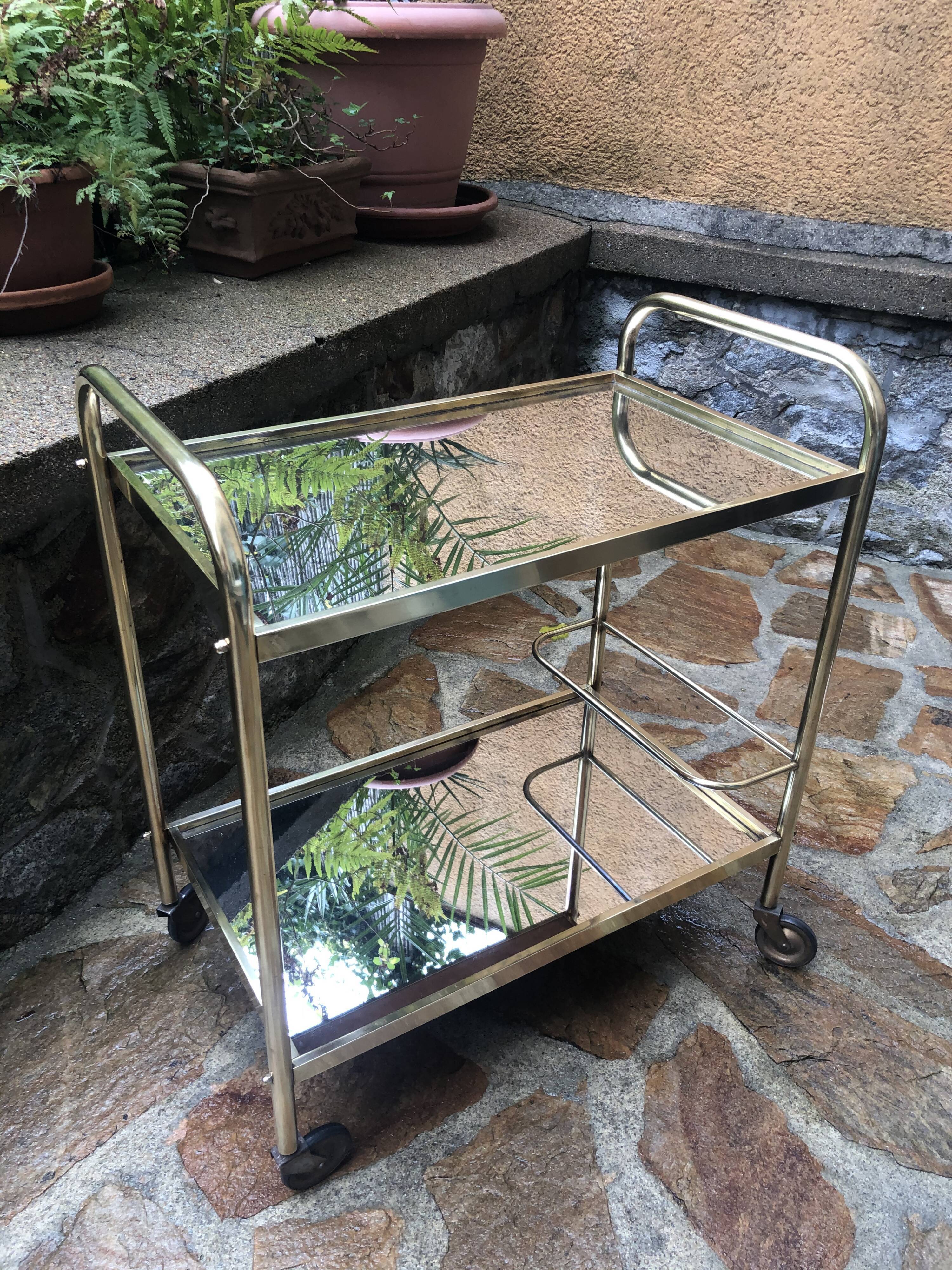 Golden rolling desserte vintage mirror trays