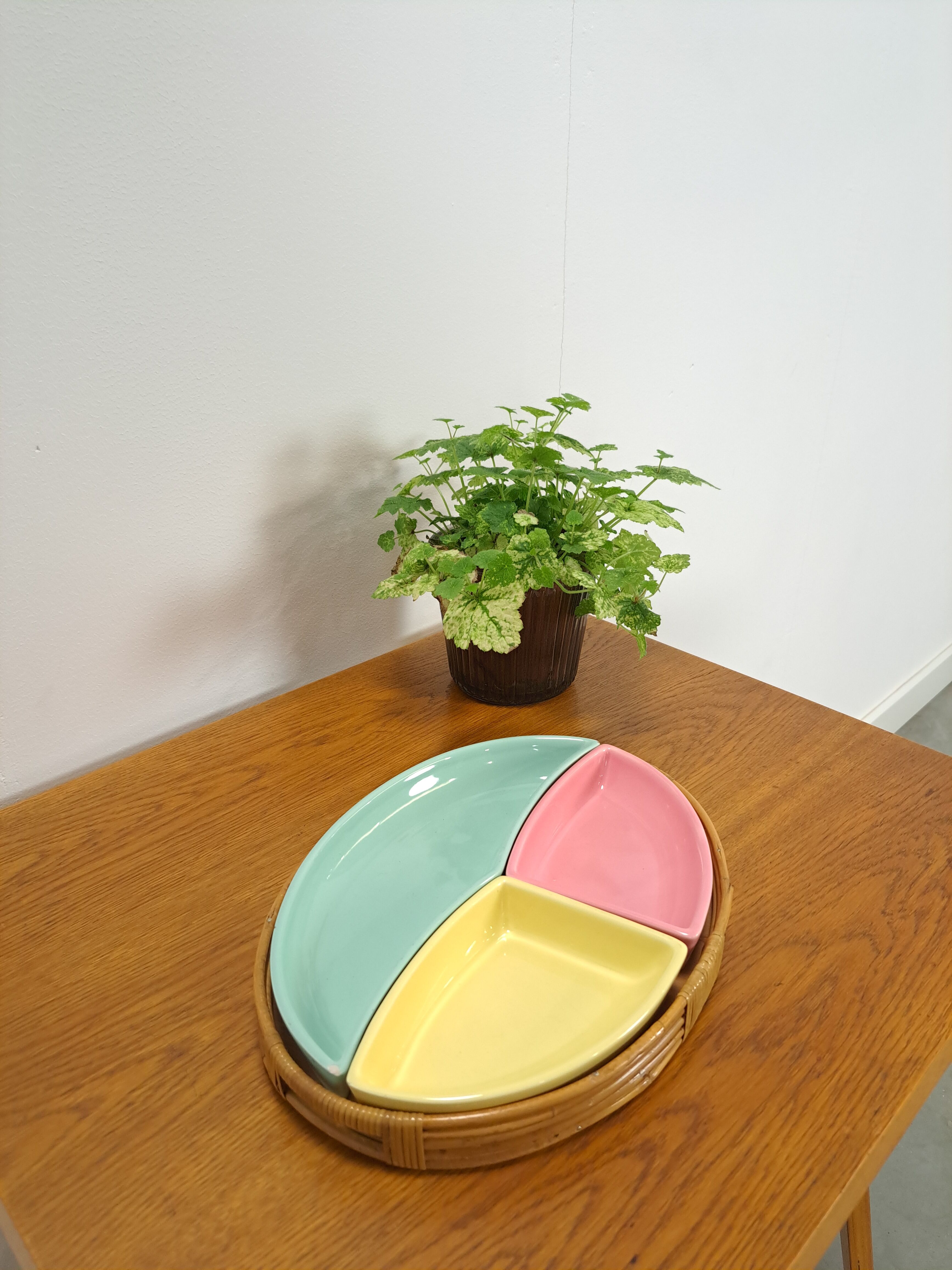 Pastel color bowls set in rattan basket vintage