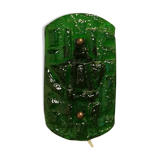 Old wall lamp made of hard pressed green glass.