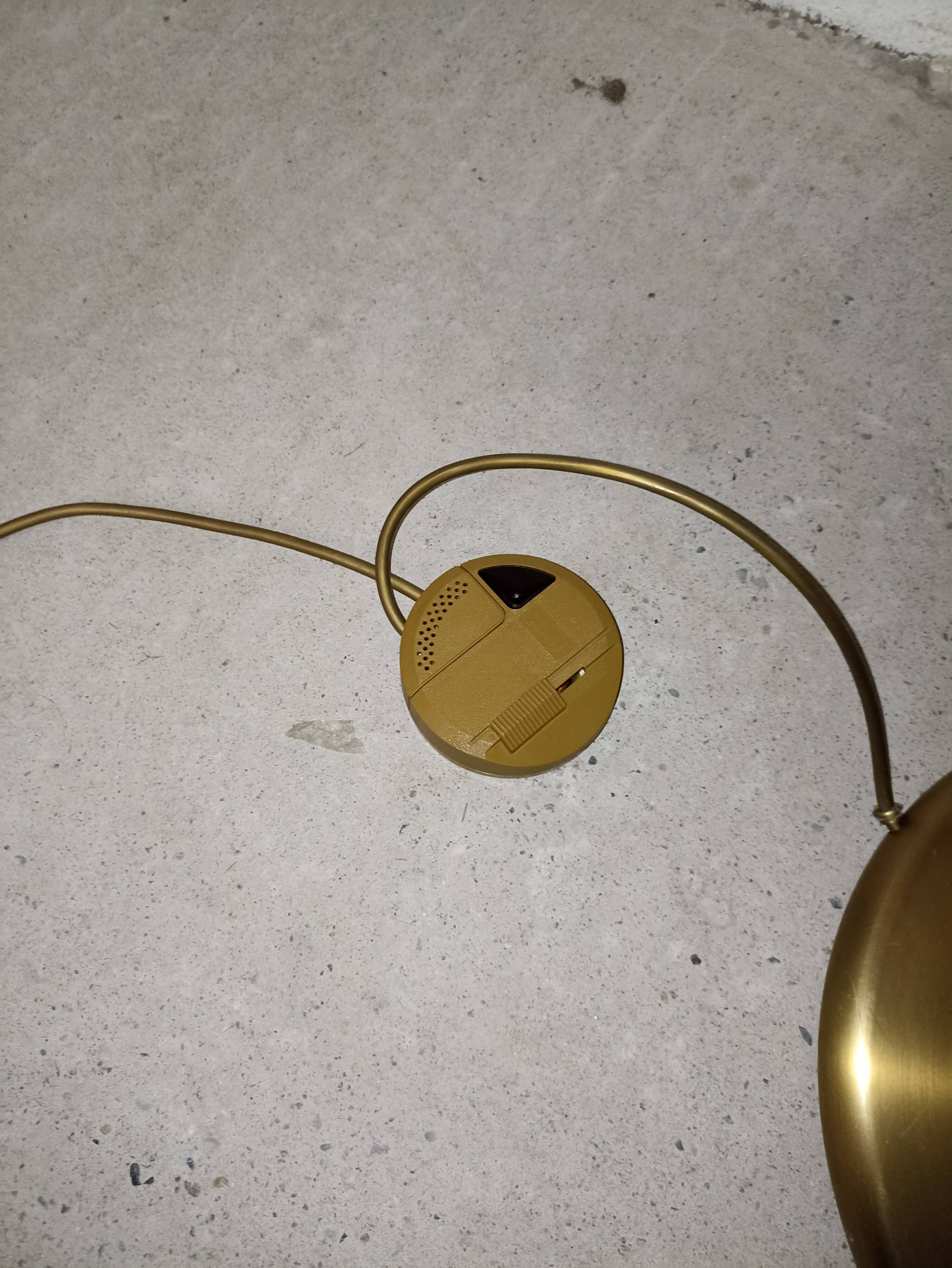 Brass articulated floor lamp