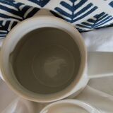 White and silver porcelain teapot