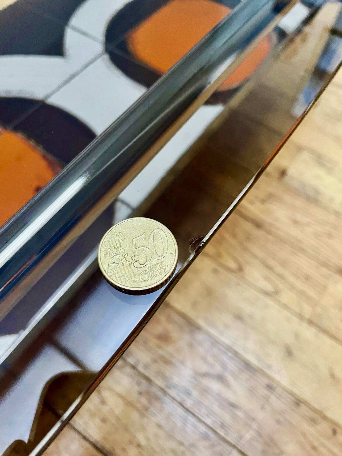 Vintage coffee table in smoked glass and ceramic