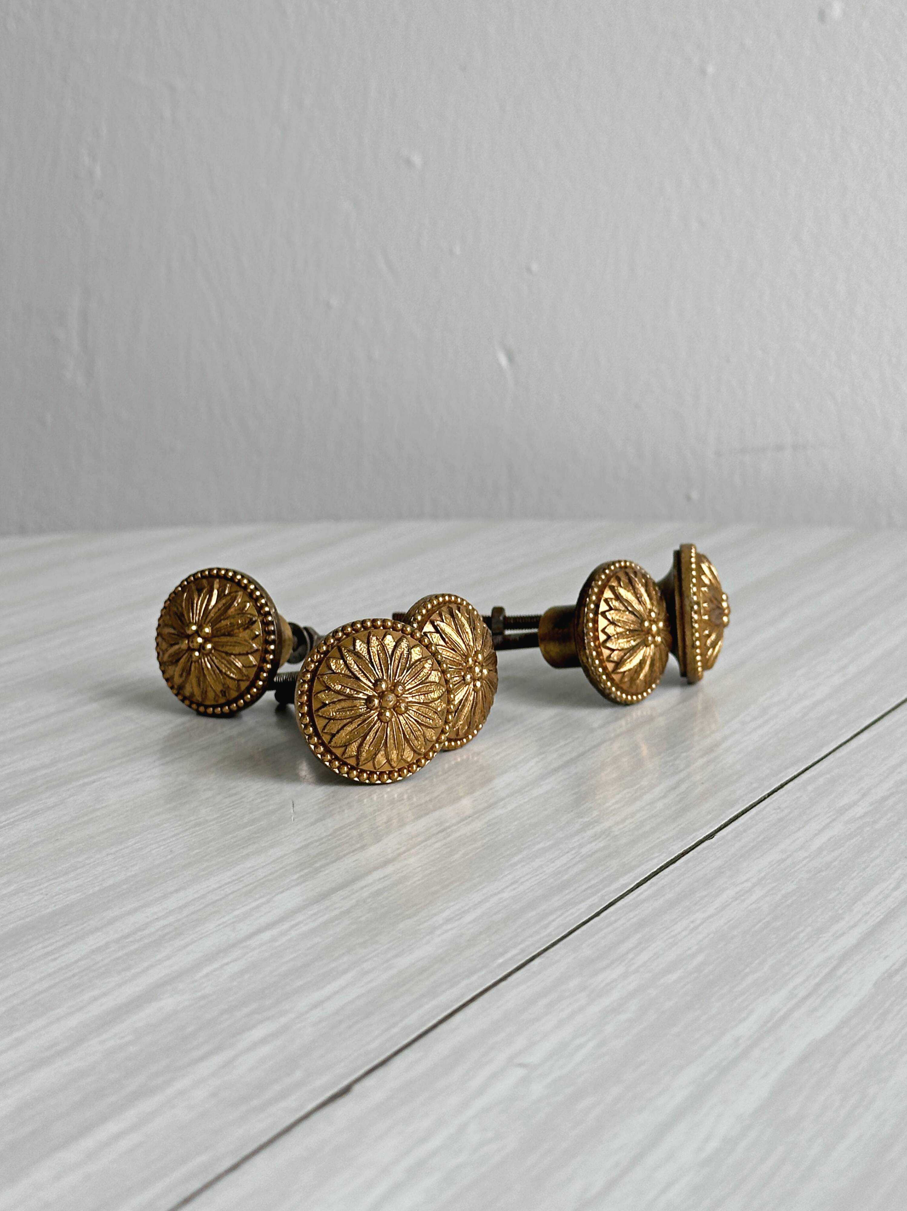 Set of 5 antique brass furniture knobs