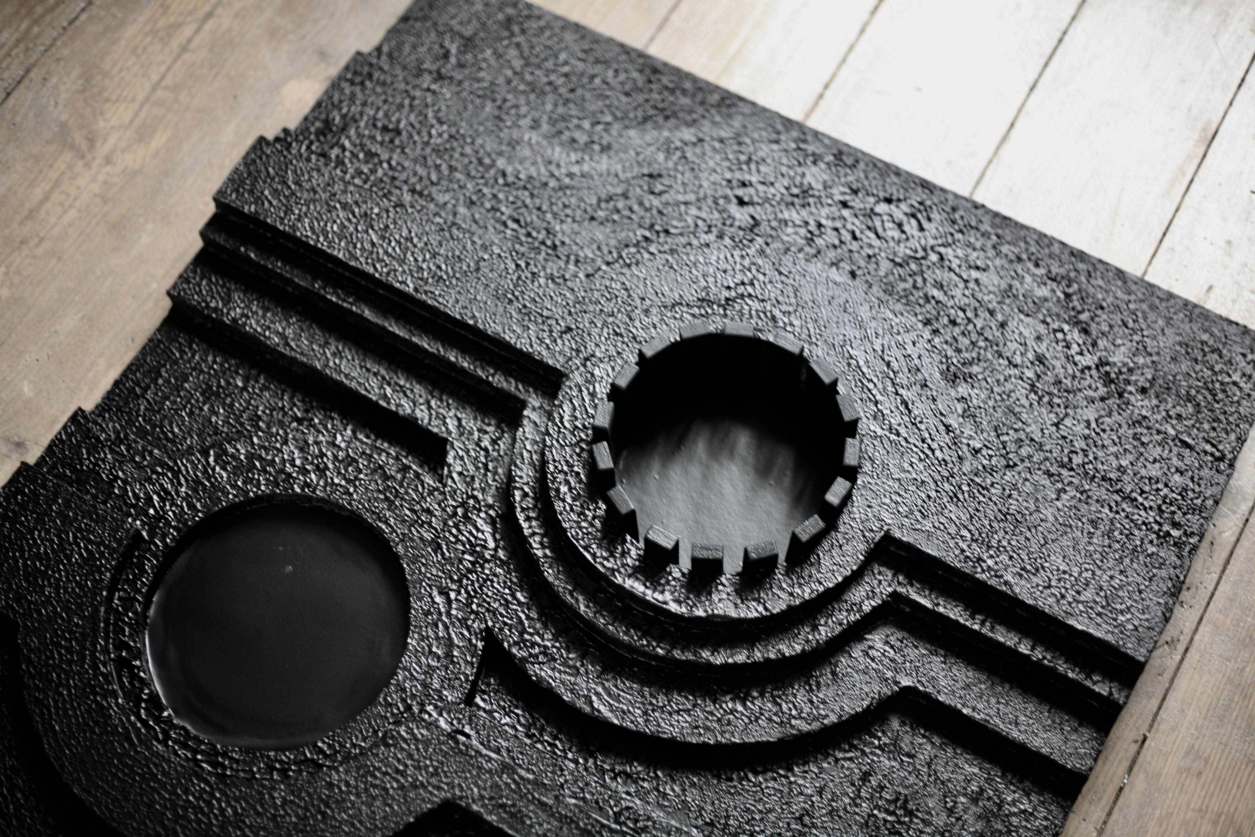 Wall sculpture, wood and black coating, late 1970s