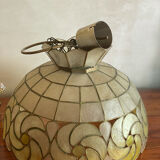 Mother-of-pearl and brass suspension