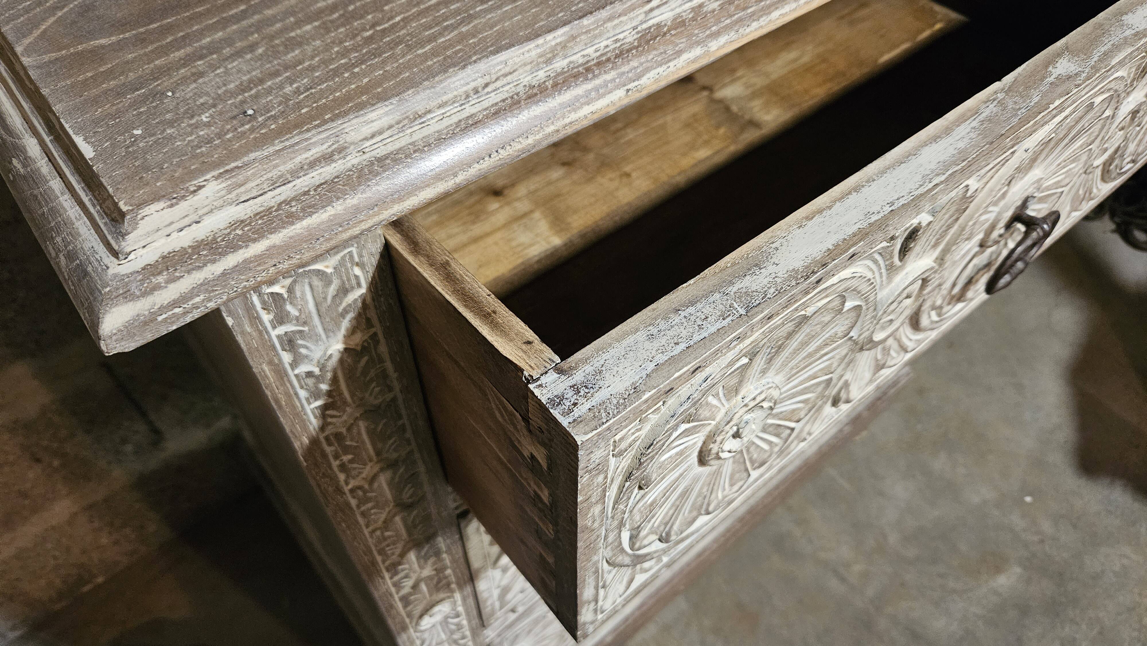 Carved chest of drawers
