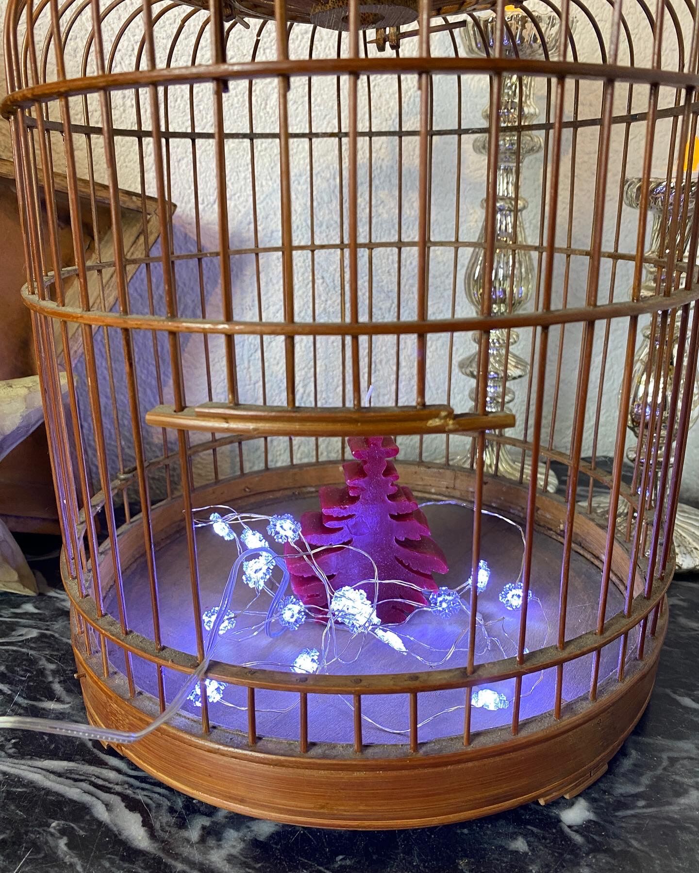 Old bird cage made of bamboo and wood