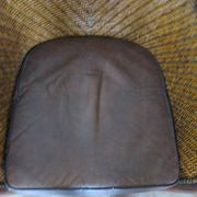 Woven rattan armchair and exotic wood in colonial style, 1980s.