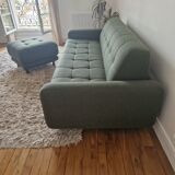 Green fabric sofa and its footrest/ottoman