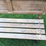 Wooden bench with back