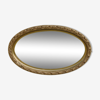 Bevelled oval antique mirror
