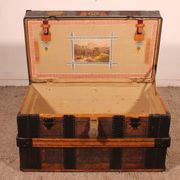 travel trunk from the early 20th century made of leather and wood