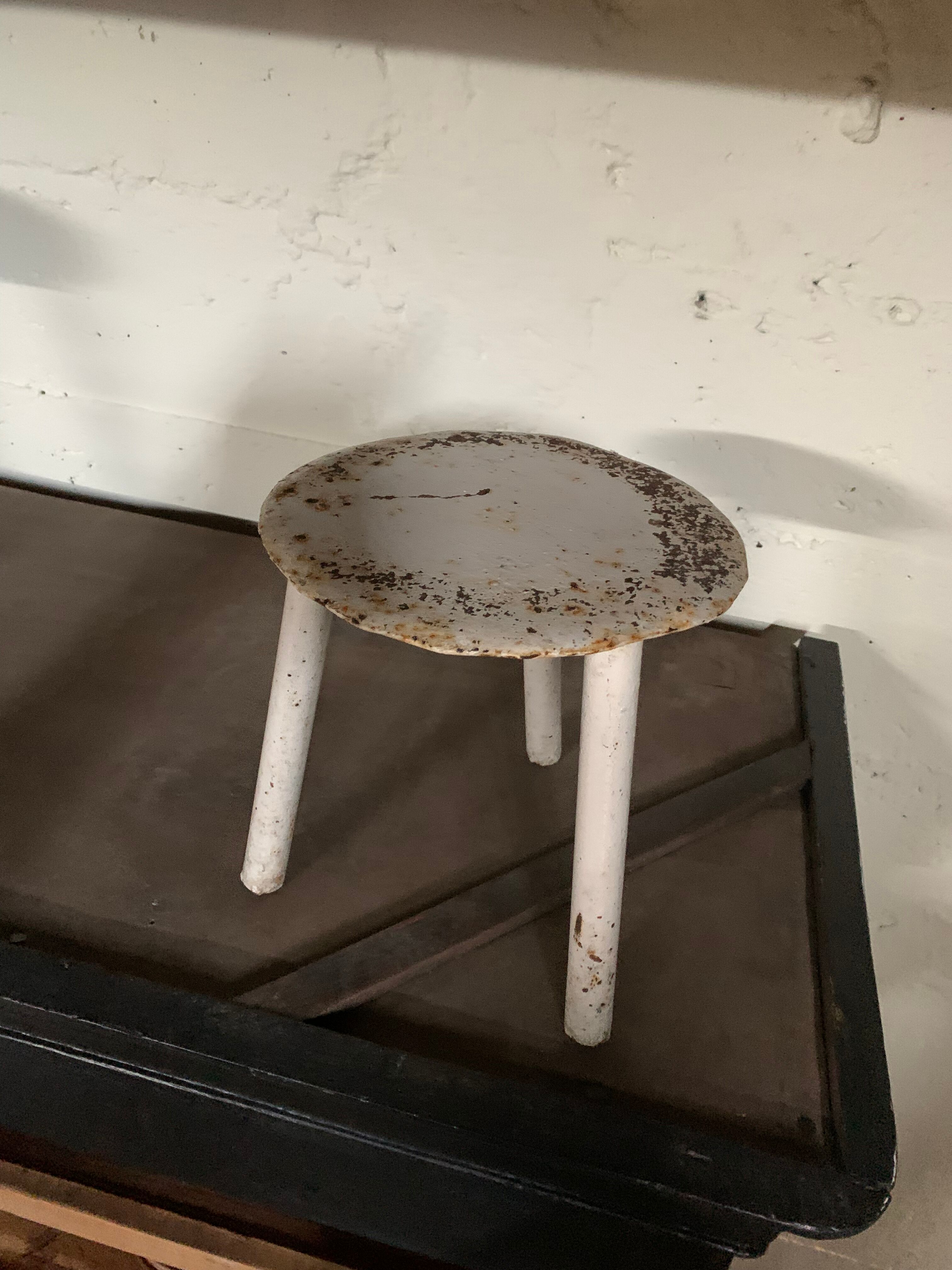Steel tripod stool