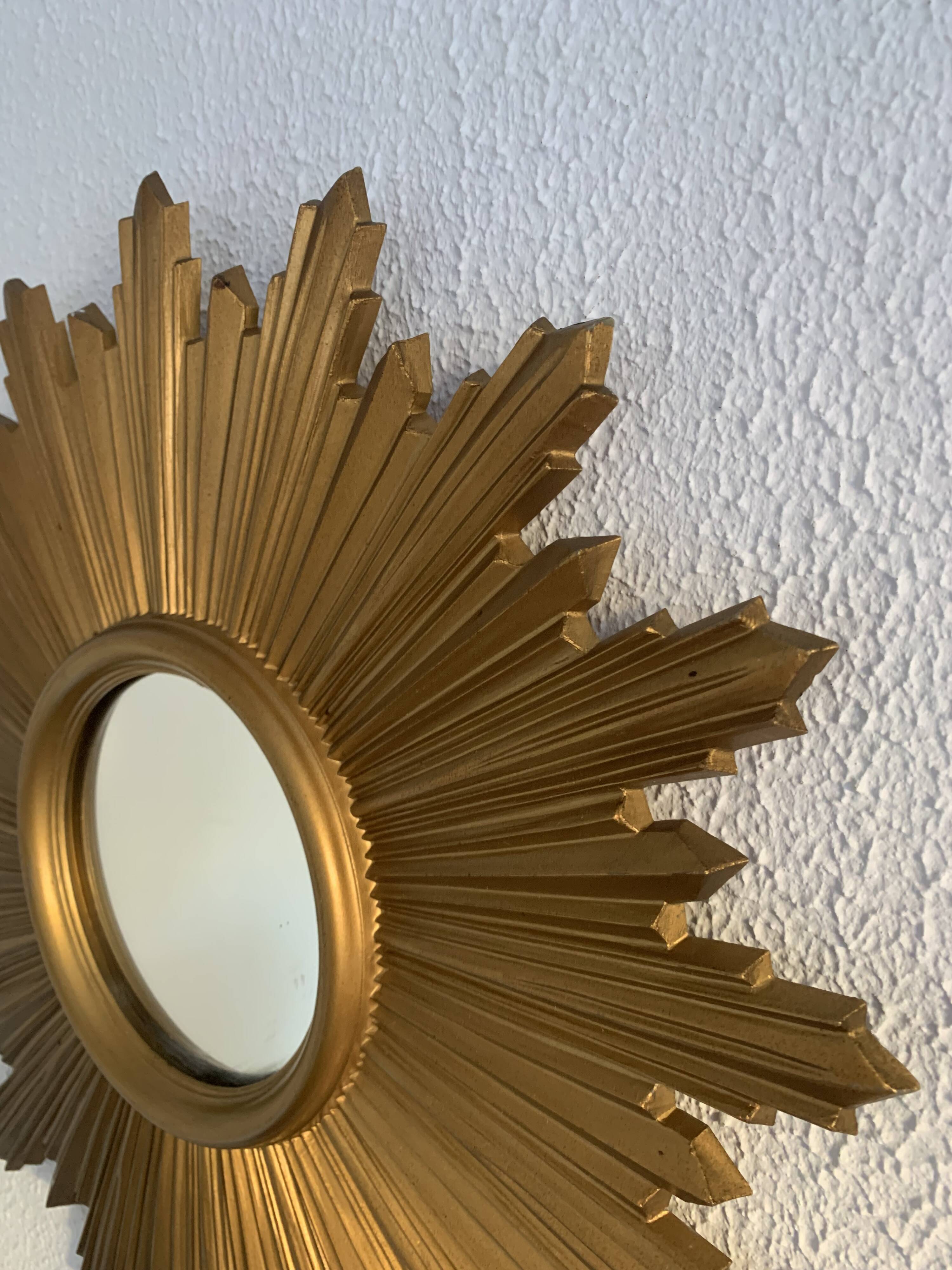 Vintage 1970s gold plastic sun mirror - 44 cm
